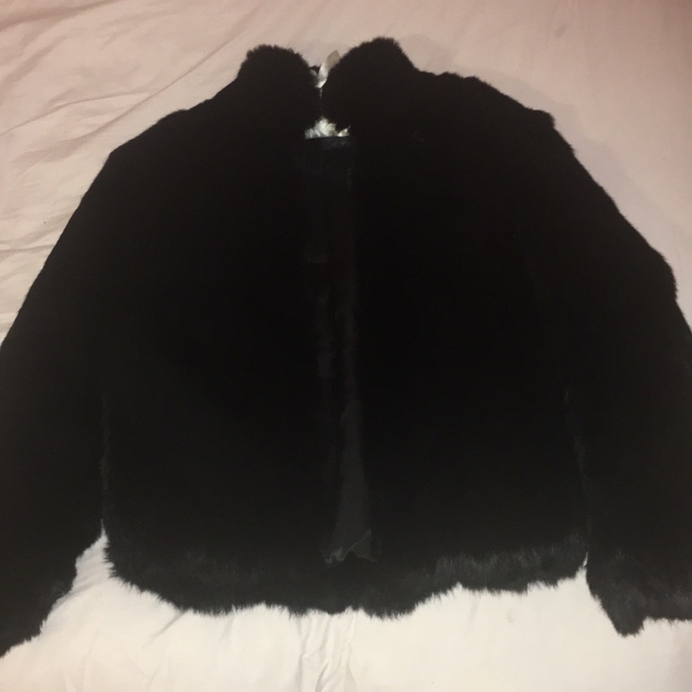 Children’s black rabbit fur jacket.